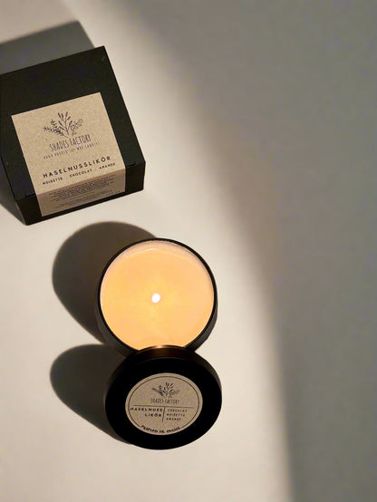 Haselnusslikör candle I Luxury scented soy wax candle in black tin jar