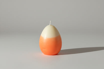 Two-tone orange and white candle 