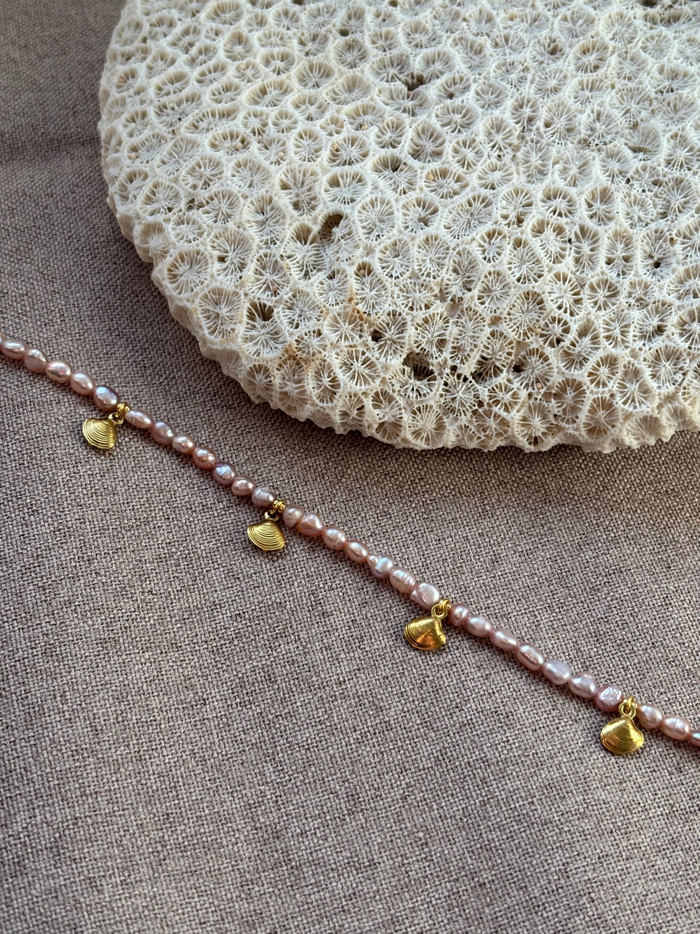 Freshwater pearls pink with shell charms